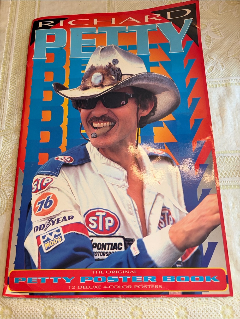 1992 Richard Petty Poster Collection Book with 12-11”x17” Colored Posters.